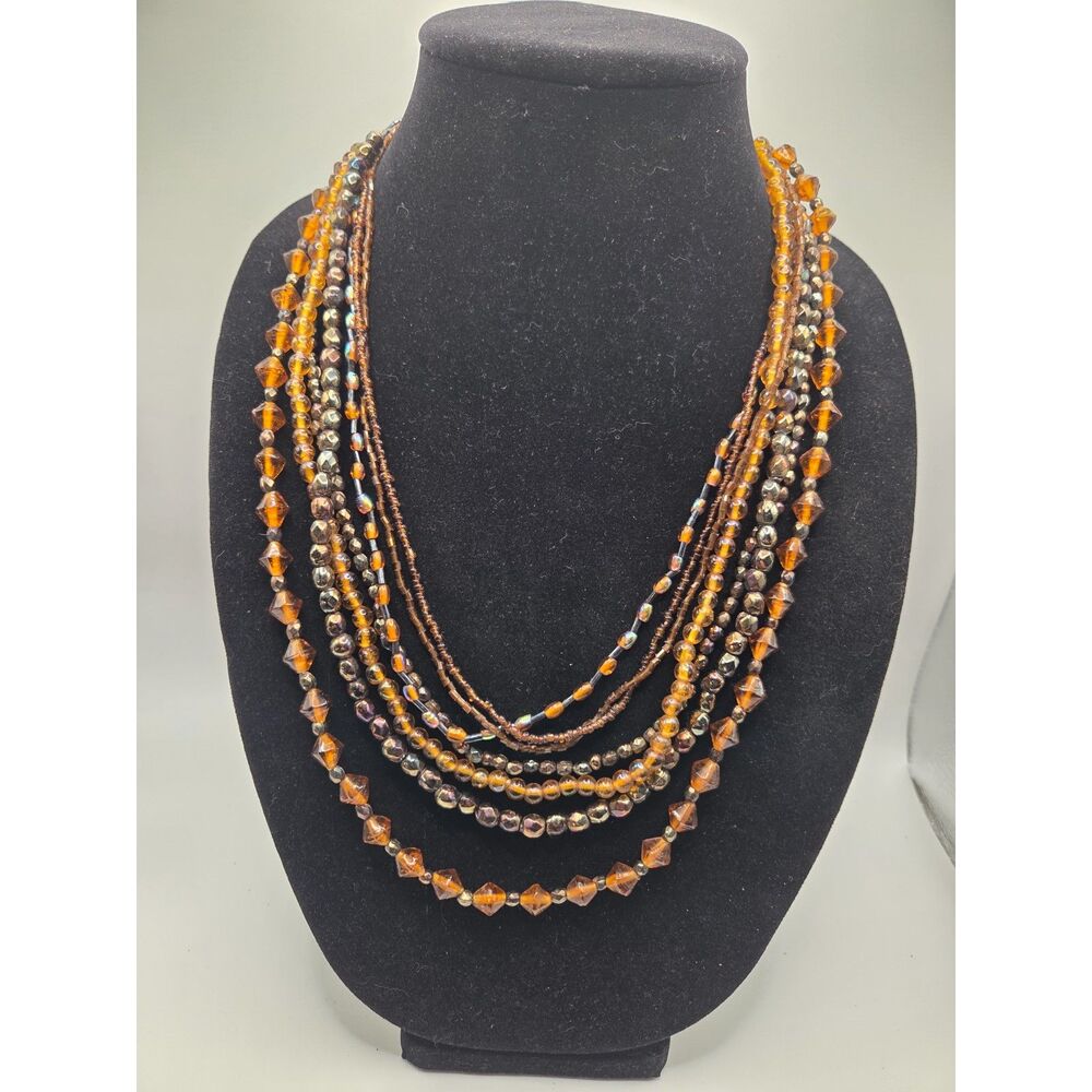 1763. Vintage Multi Strand Amber and Brown Glass Beaded Necklace